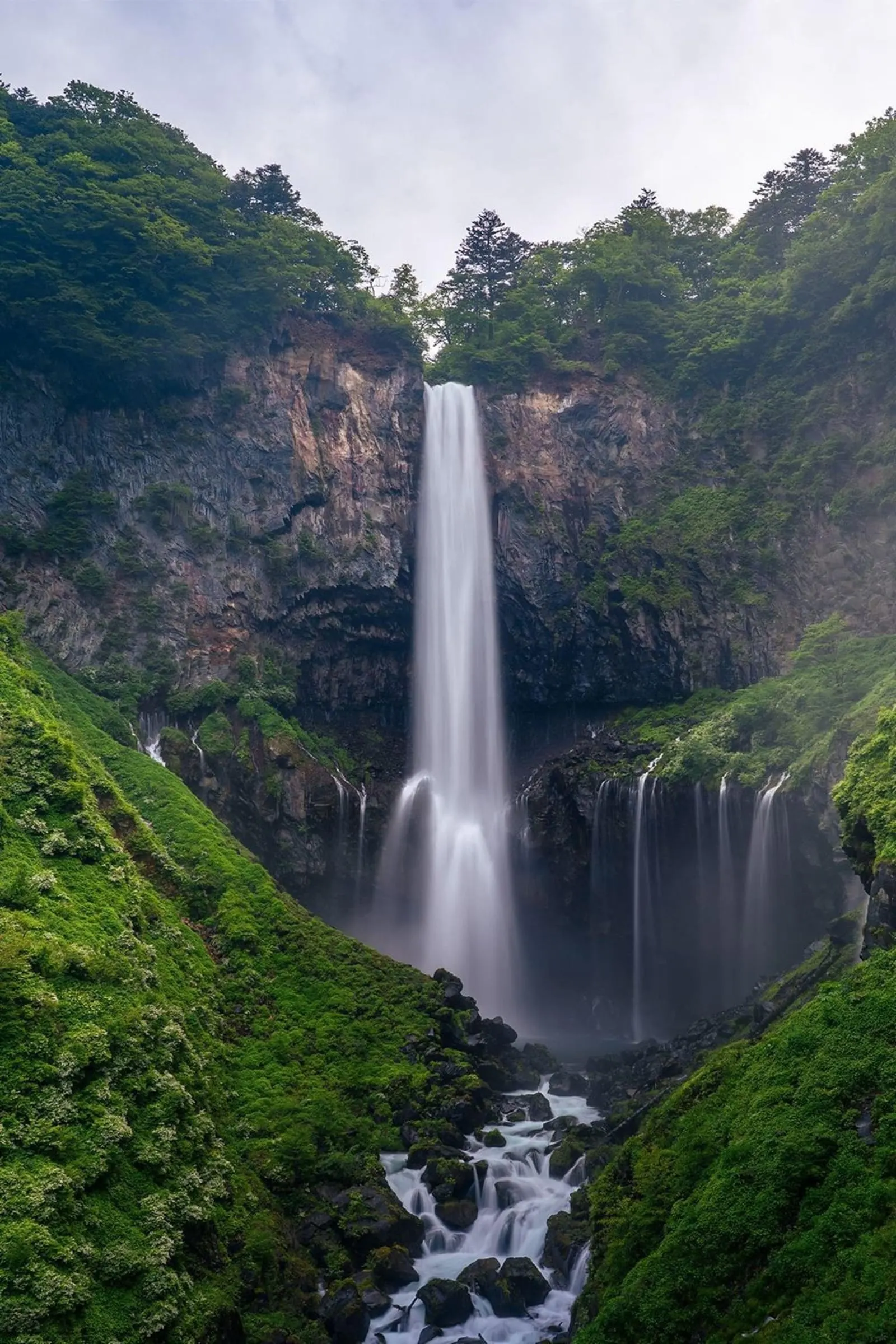 Kegon Falls in a misty gorge